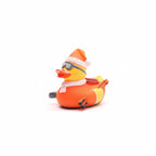 Rubber duck with ski goggles, Santa hat, on a white background