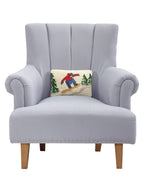 Gray armchair with a decorative pillow featuring a snowboarder on a white background