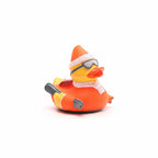 Rubber duck dressed in orange winter gear with goggles and scarf on a white background