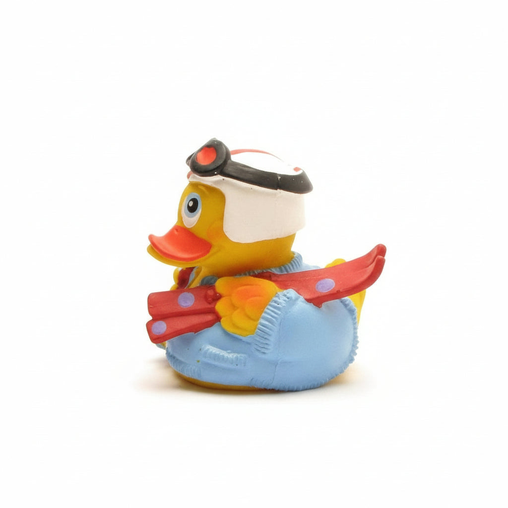 Rubber duck dressed as a skier with a white background
