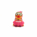 Toy duck in a pink racing suit on a white background