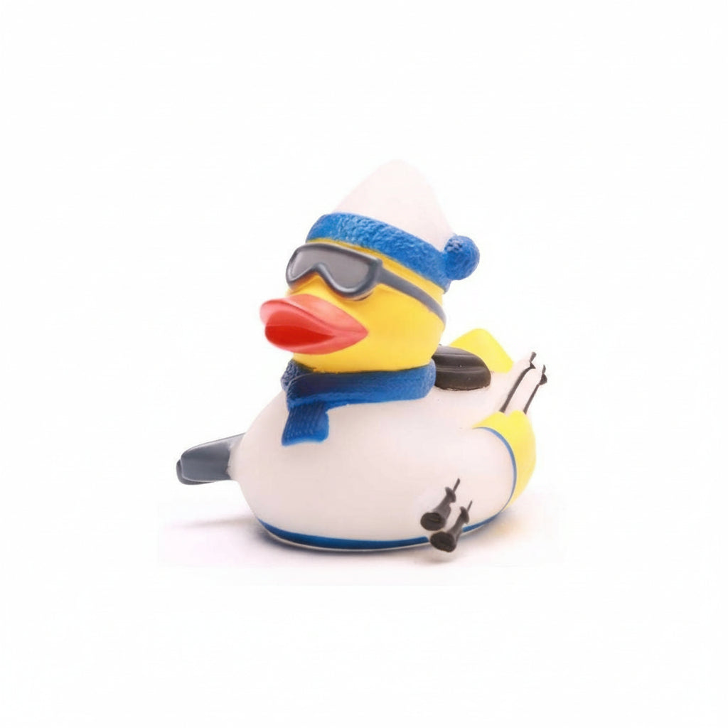 Rubber duck with sunglasses, blue beanie, and scarf on a white background