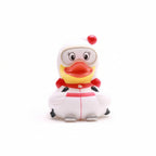 Toy duck with a white outfit and red accents on a white background
