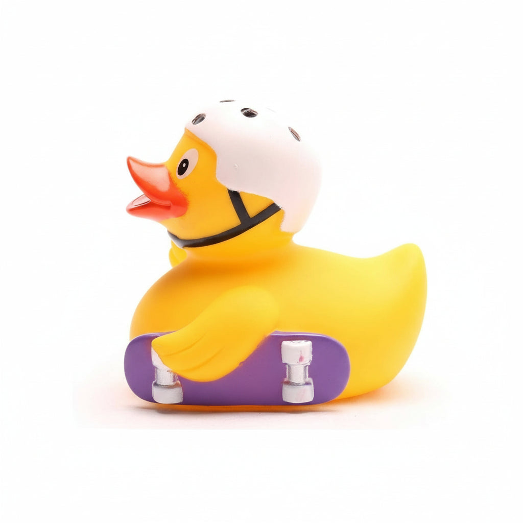 Yellow rubber duck with a purple skateboard on a white background