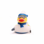 Rubber duck wearing a blue beanie, goggles, and scarf on a white background